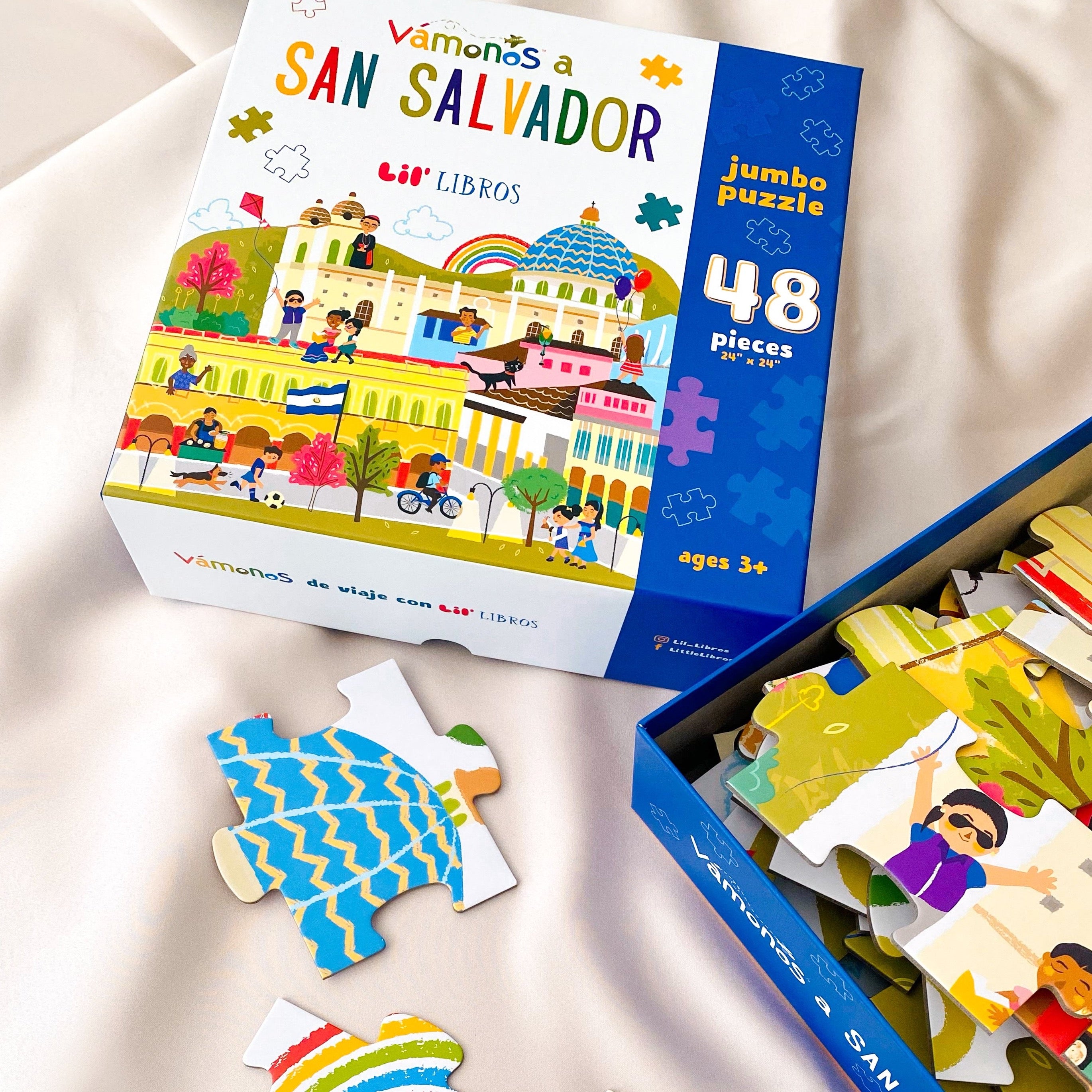 Image of VÁMONOS: San Salvador Jumbo Puzzle with scattered puzzle pieces.